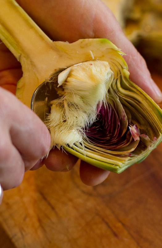 The sharper the edge of the spoon the easier it is to do this.