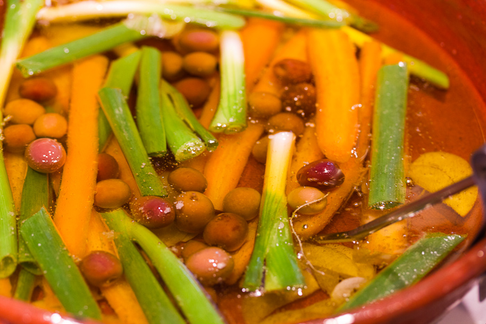 Add root vegetables first (after the lemon and garlic), then the other ingredients.