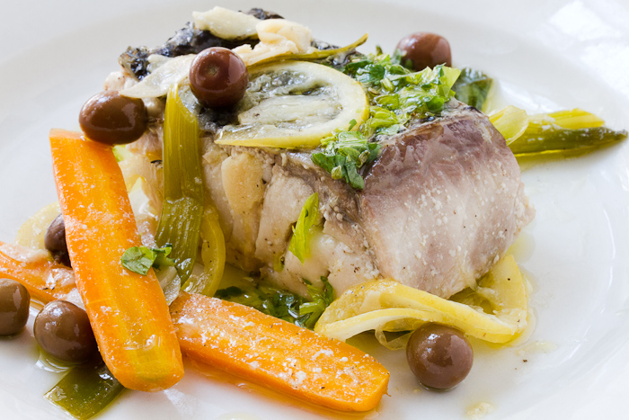 Striped bass poached in olive oil.