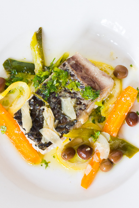 Striped bass poached in olive oil.